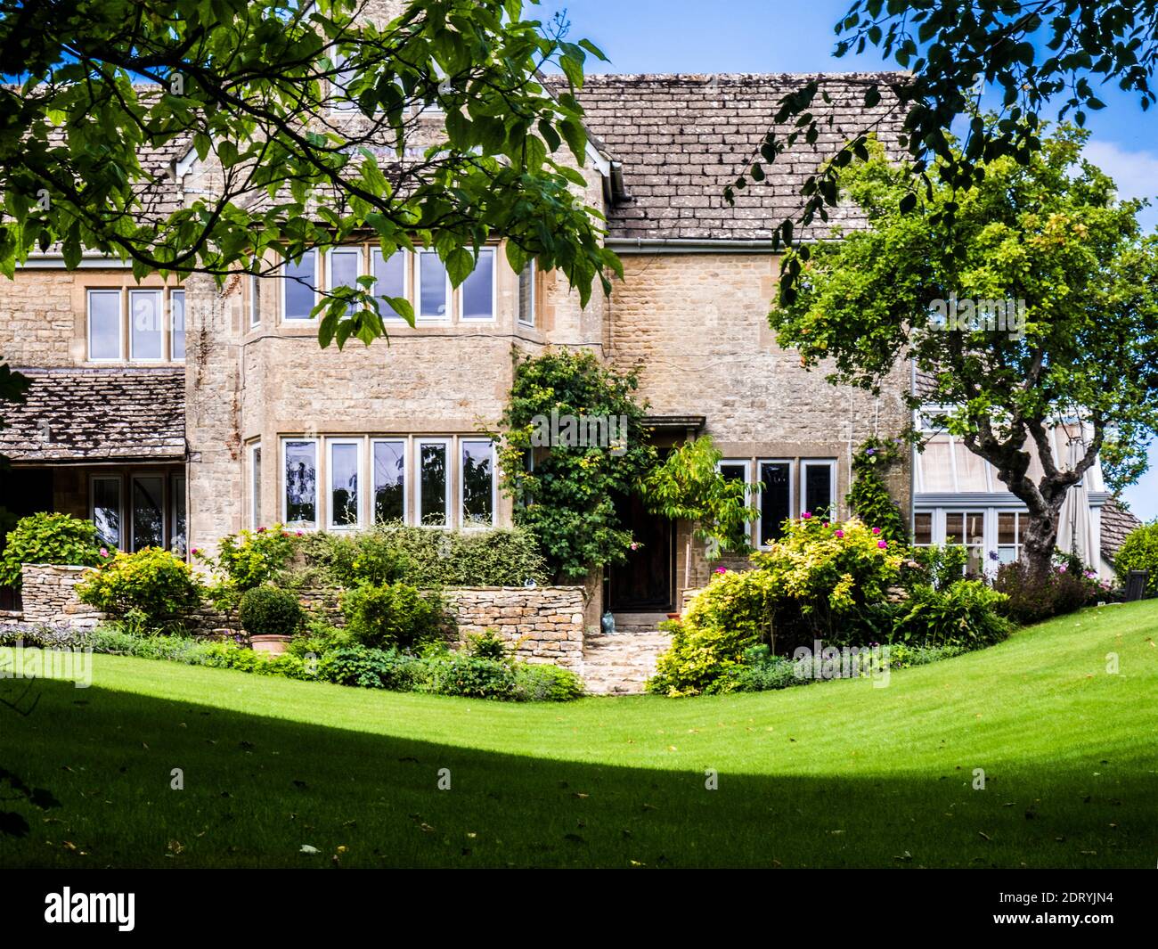 A large country house in the Gloucestershire Cotswolds. Stock Photo