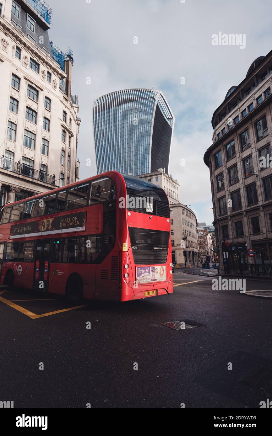 London, UK - December 2020 : 20 Fenchurch Street in the City of London, with  red bus on the quiet streets Stock Photo
