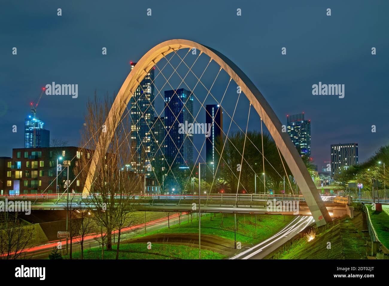 Modern 2021Manchester skyline from south with Hulme Arch featuring and Princess Road approach from the South and Manchester Airport. Stock Photo