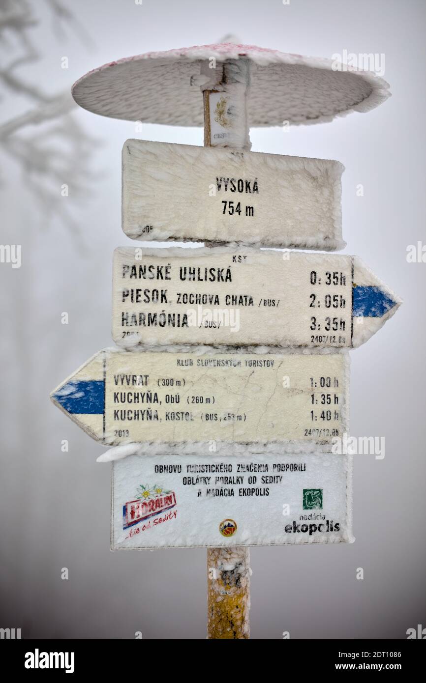 Hiking direction signs at hill Vysoka in Carpathians near Modra, Slovakia Stock Photo