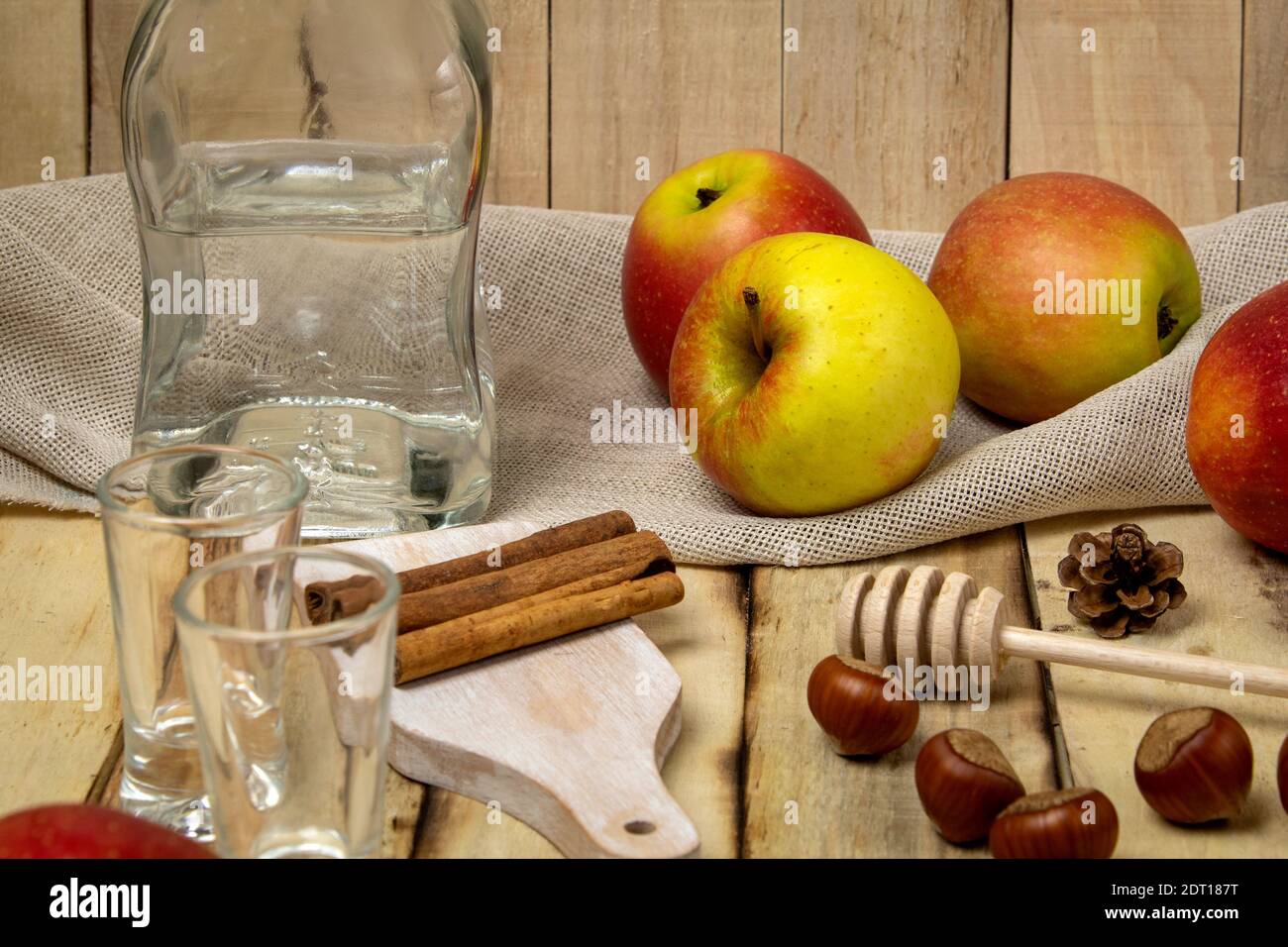 Natural homemade vodka made from apples and sugar. Homemade apple vodka grown in the garden Stock Photo