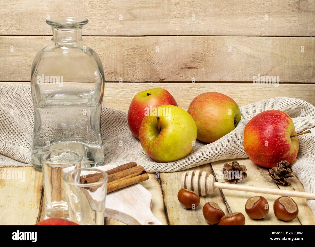 Natural homemade vodka made from apples and sugar. Homemade apple vodka grown in the garden Stock Photo