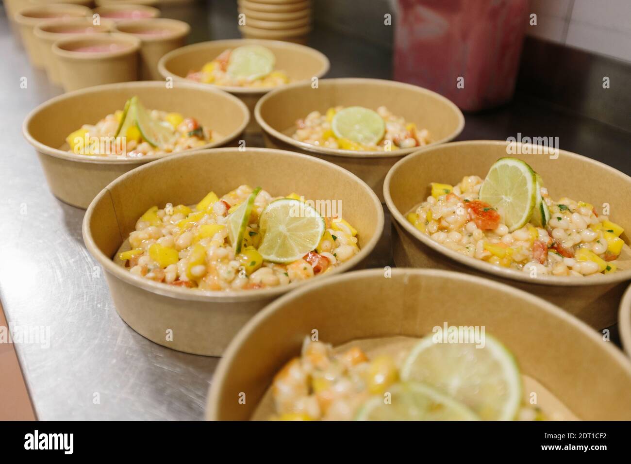 Vegetable salads prepared in a restaurant kitchen to take away. The