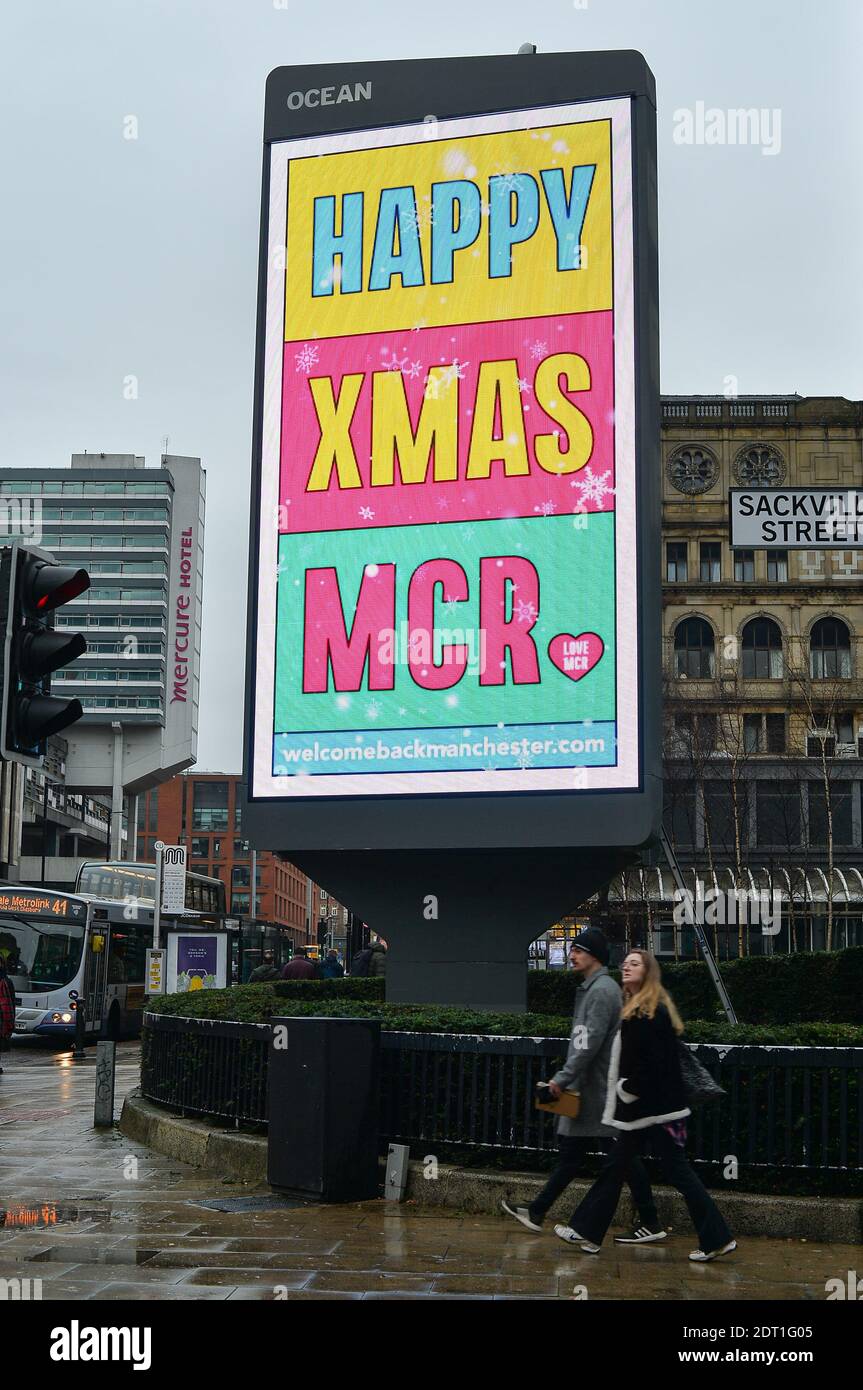 MANCHESTER, UK A Happy Xmas MCR sign in Manchester city centre, as a new variant of COVID-19 keeps Christmas shoppers at home, on Monday 21st December 2020. (Credit: Pat Scaasi | MI News) Credit: MI News & Sport /Alamy Live News Stock Photo