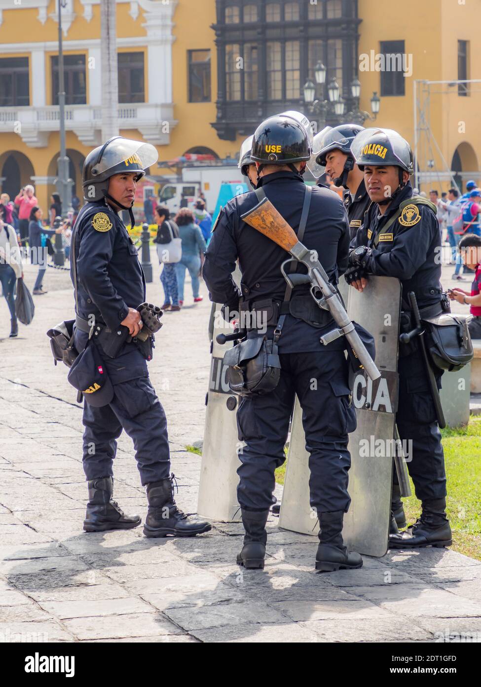 Lima, Peru - September 26, 2019: Policemen in helmets with weapons on the streets of Lima. Policia. South America. Stock Photo