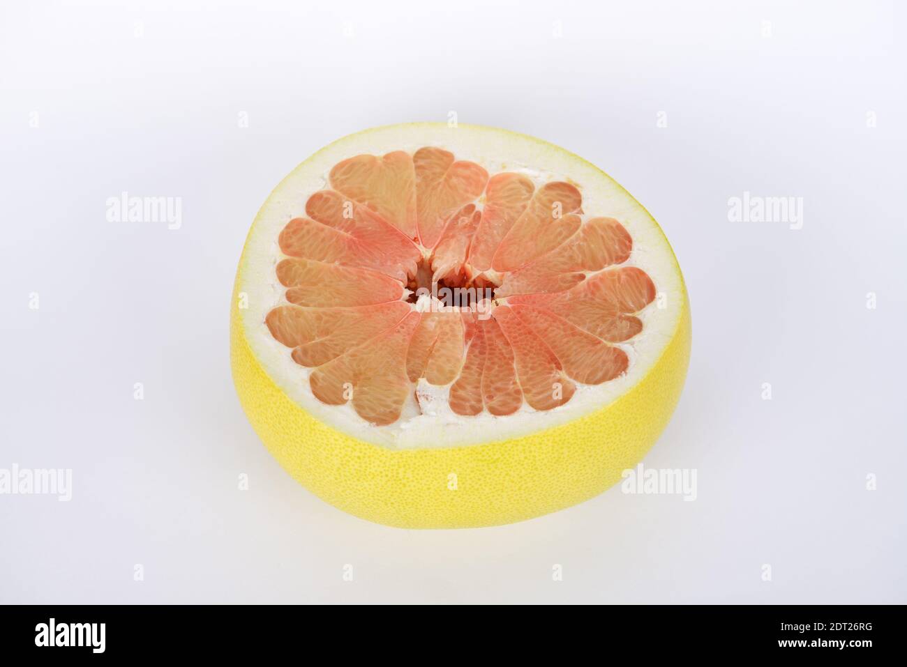 Sliced Red Pomelo fruit from South Korea on white background Stock