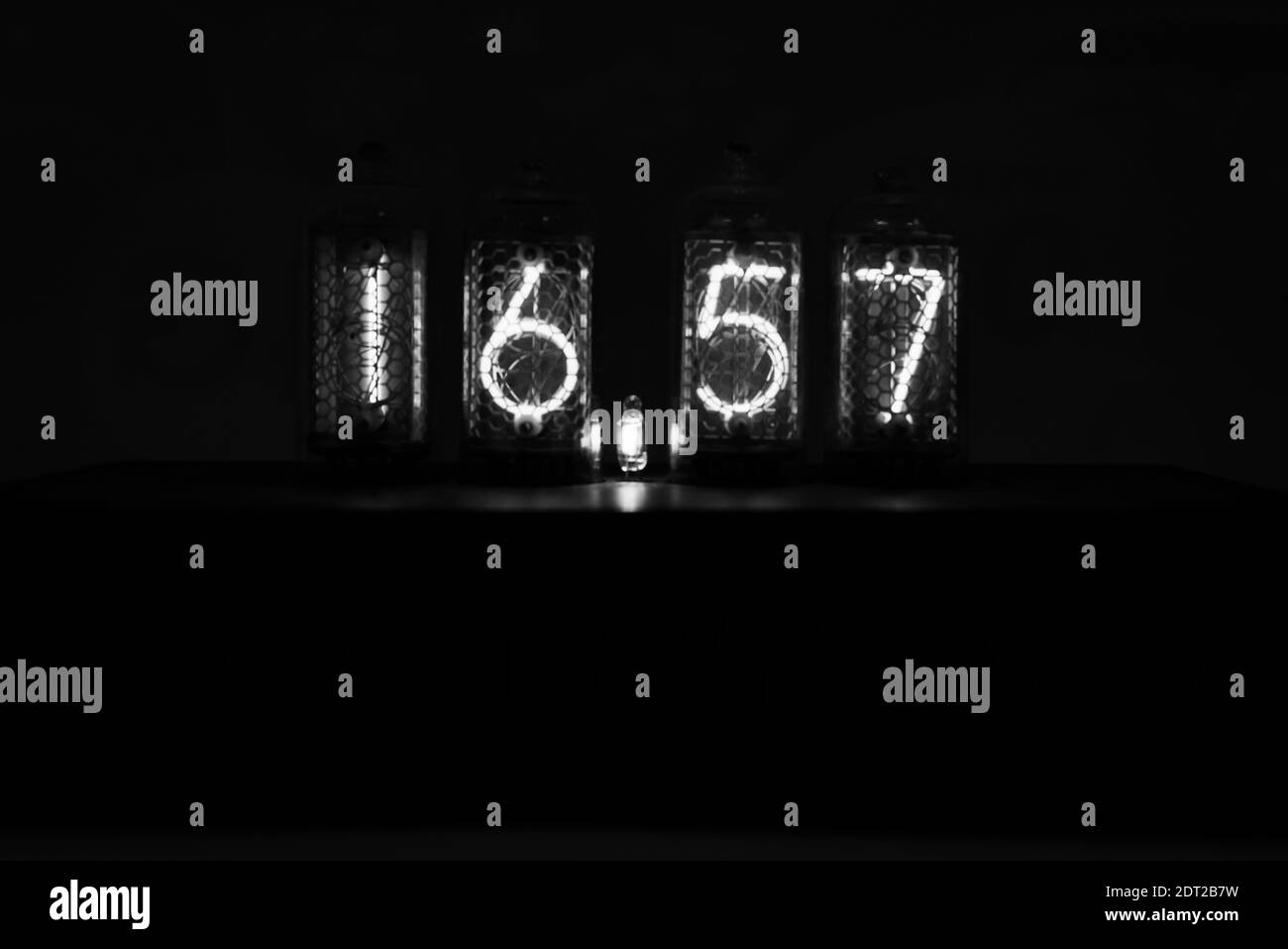 Illuminated Numbers In Darkroom Stock Photo Alamy