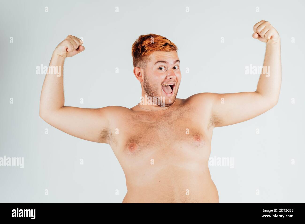 Young man with chest bare, flexing muscles Stock Photo - Alamy