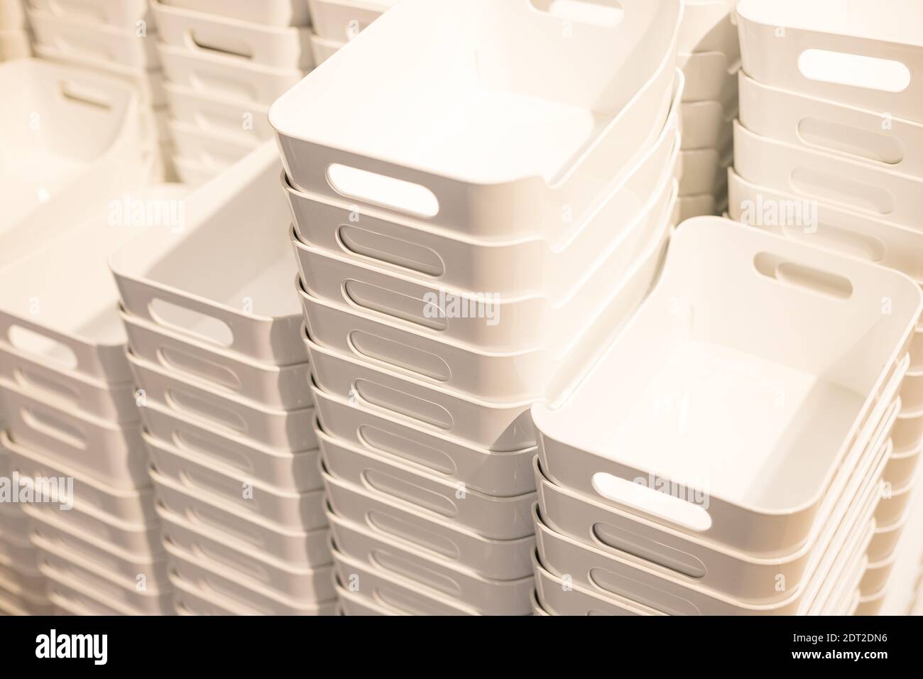 Stacked empty plastic box. folded plastic containers at store Stock Photo