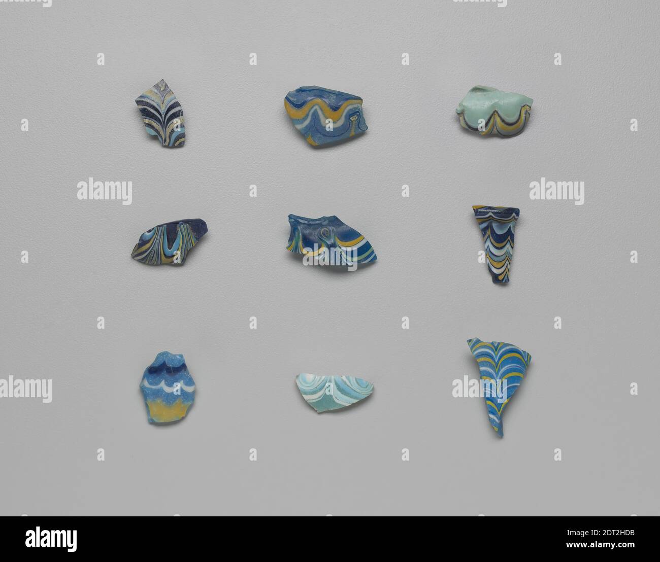 Fragments of Vessels, Core-formed glass, .1 (mo2002.794.1): 3.3 × 2.2 × 0.5 cm (1 1/4 × 7/8 × 3/16 in.), Classics Department Transfer, On view*, Egyptian, New Kingdom, Dynasty 18–20, Containers - Glass Stock Photo