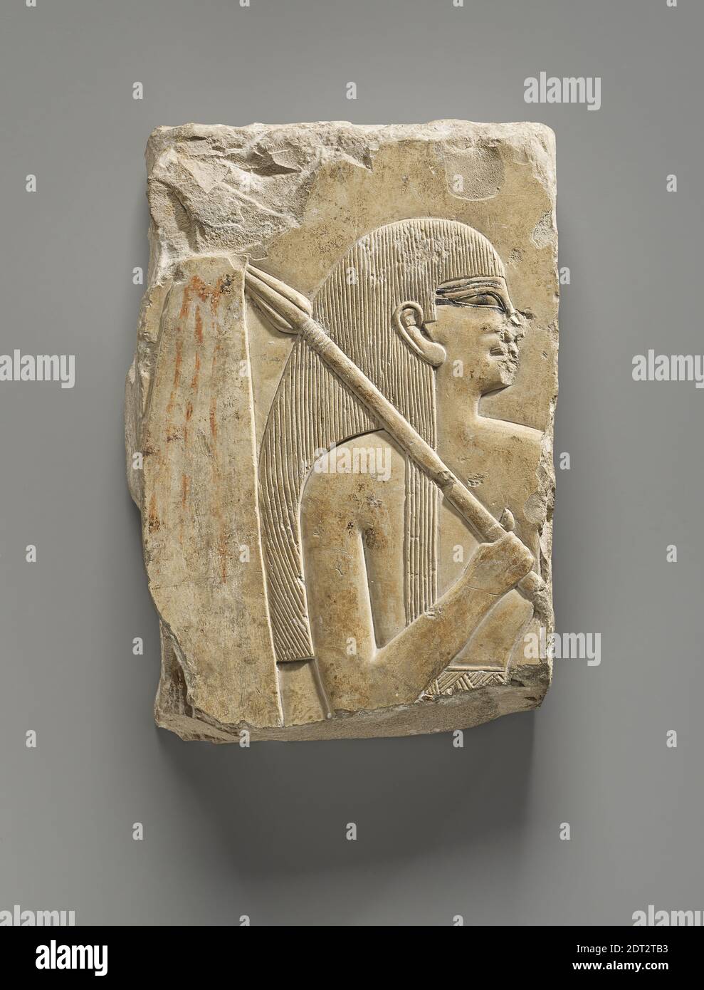 Relief Depicting a Sunshade Bearer, Painted limestone, 19.5 × 13 cm (7 11/16 × 5 1/8 in.), Egyptian, Dynasty 11, Reign of Neb-hepet-re Montuhotep, Sculpture Stock Photo
