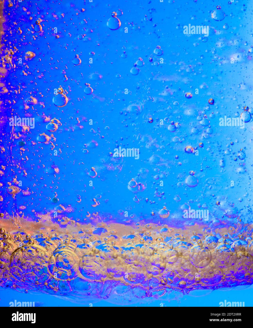 Brightly coloured abstract with bubbles caused by a chemical reaction Stock Photo Alamy