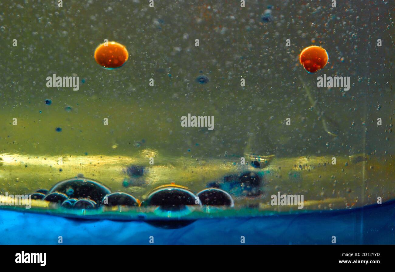 Brightly coloured abstract with bubbles caused by a chemical reaction