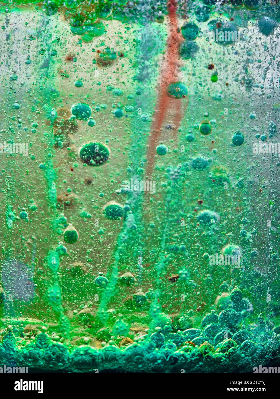 Brightly coloured abstract with bubbles caused by a chemical reaction Stock Photo Alamy