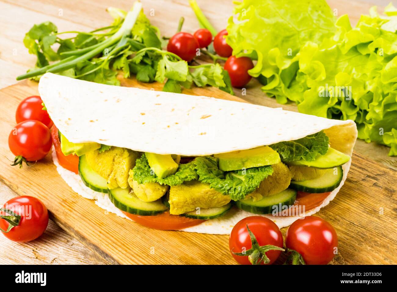 Chicken stuffed shawarma tortilla tacos wraps doner kebab sandwich gyros fast food with