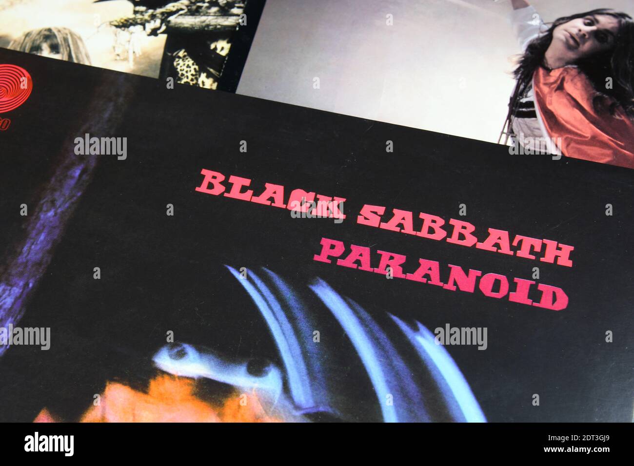 Viersen, Germany - May 9. 2020: Close up of isolated vinyl record covers of rock band Black Sabbath paranoid (focus on center) Stock Photo