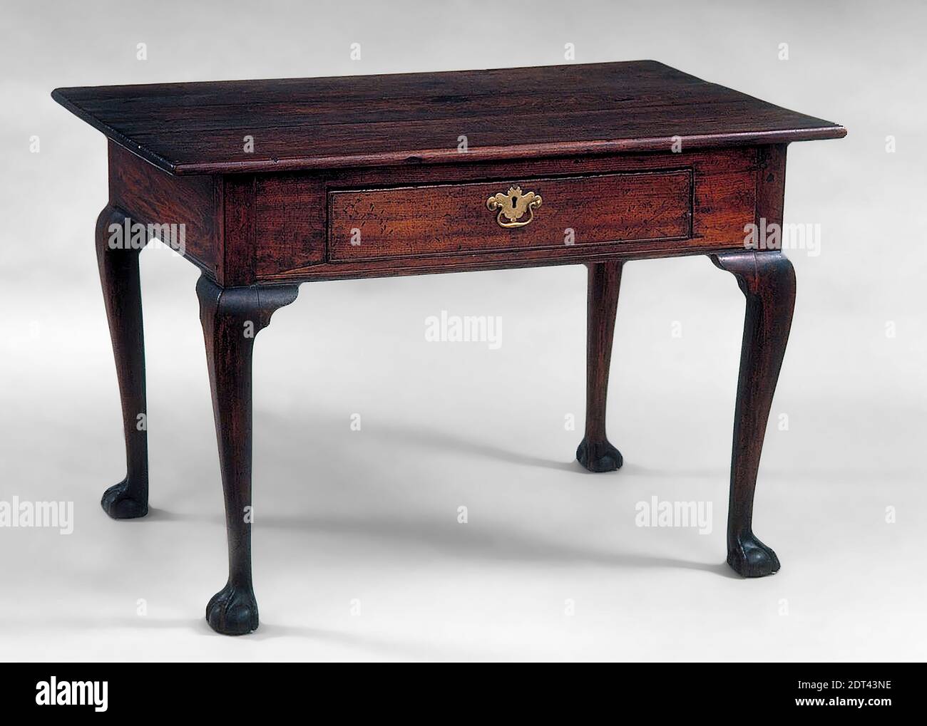 Table with Drawer, The primary wood, as well as the diagonal brace under the top and the drawer runners, has been identified as belonging to the family Lauraceae (laurel) and may possibly be red bay. The other secondary woods are mahogany (drawer sides and back) and baldcypress (drawer bottom), 28 3/4 × 42 15/16 × 28 7/16 in. (73 × 109.1 × 72.2 cm), Made in Charleston, South Carolina, North America, American, 18th century, Furniture Stock Photo