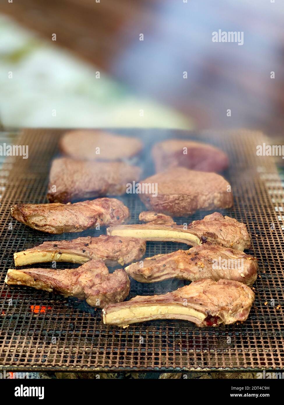 High Angle View Of Meat On Barbecue Grill Stock Photo