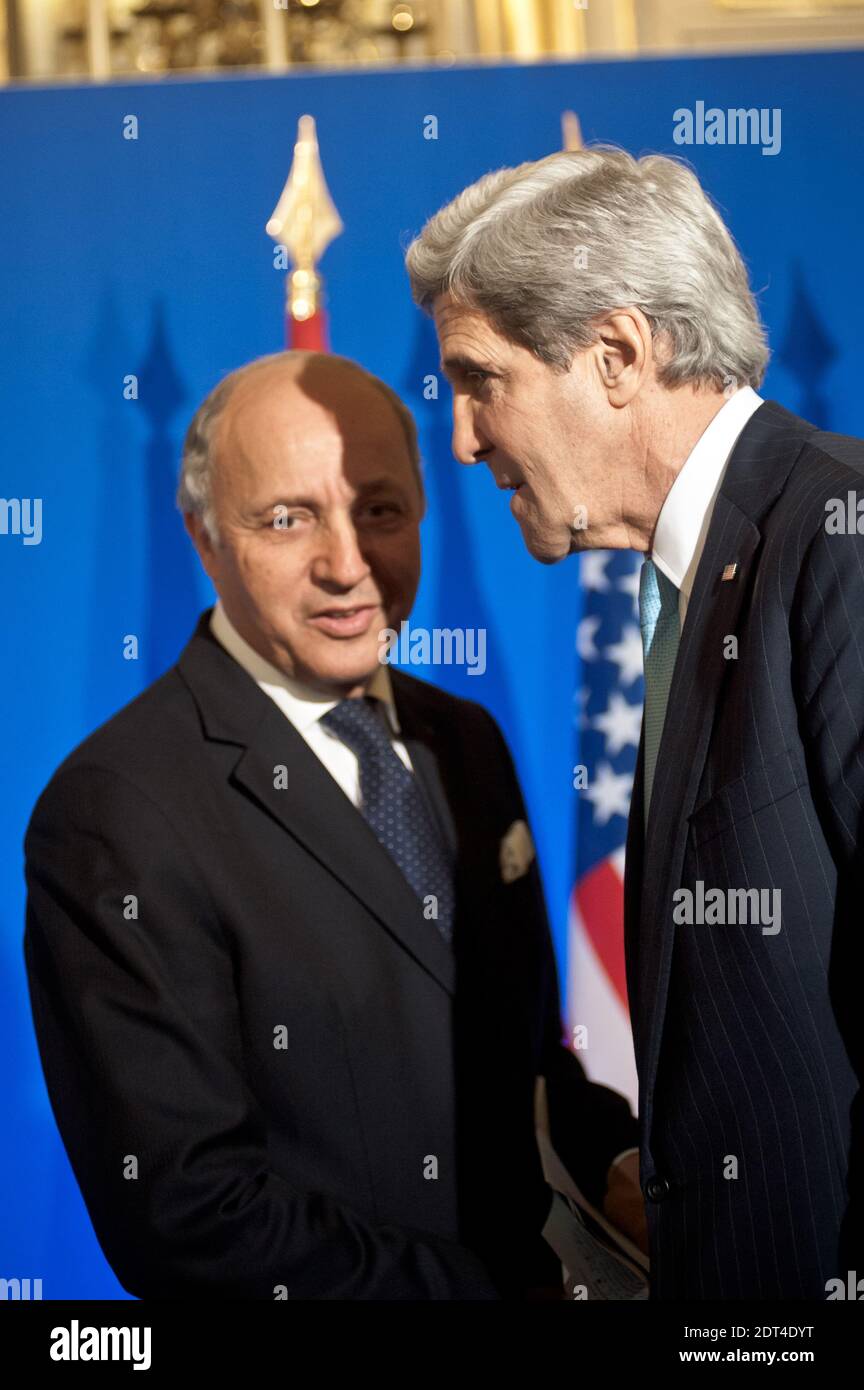 John Kerry and Laurent Fabius pictured during the press conference in Paris. The eleven countries of the Group of Friends of Syria met in Paris to convince the opposition to participate in Geneva-2. Laurent Fabius chaired the ministerial meeting, attended by the President of the Syrian Coalition, Ahmed Al-Jarba. Ministry of Foreign Affairs, in Paris, France, on January 12, 2014. Photo by Nicolas Messyasz/ABACAPRESS.COM Stock Photo