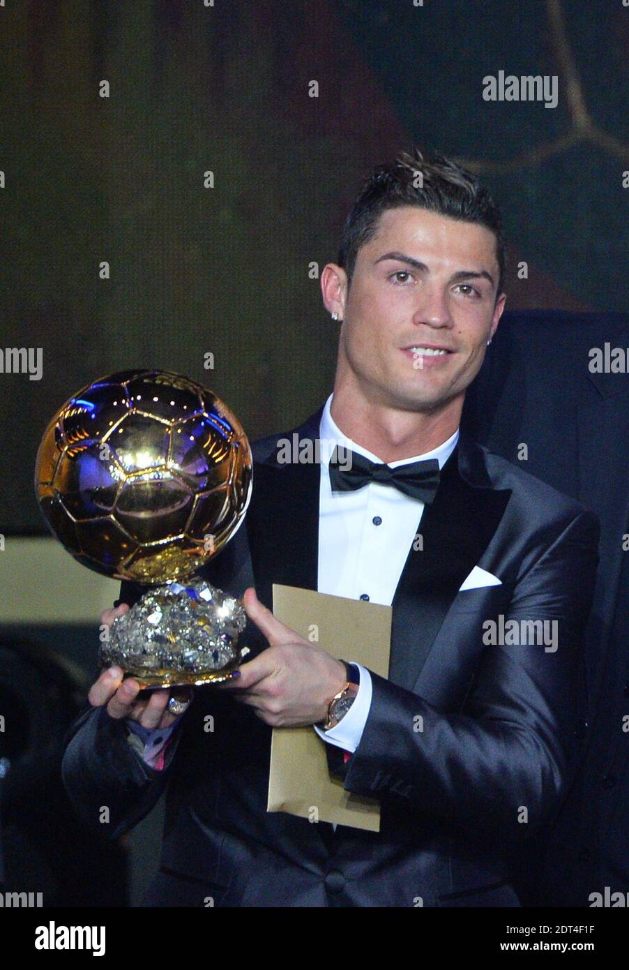 Portugal's Cristiano Ronaldo with son Cristiano Junior receiving the FIFA  Ballon d'Or award from Sepp Blatter, Francois Moriniere and Peleduring FIFA  Ballon d'Or 2013 trophy at the Kongresshalle in Zurich, Switzerland on
