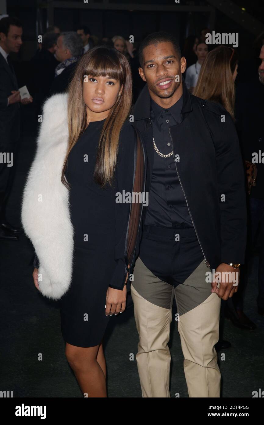 Victor Cruz and his wife Elaina Watley arriving at Givenchy collection  presentation, as part of the Men's Fall-Winter 2014/2015 Paris Fashion  Week, held at La Halle Freyssinet in Paris, France on January