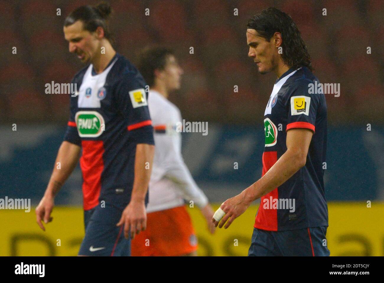 PSG's Edinson Cavani and Zlatan Ibrahimovic deception after losing the French Cup 1/16e round soccer match, PSG vs Montpellier in Paris, France, on January 22nd, 2014. Montpellier won 2-1. Photo by Henri Szwarc/ABACAPRESS.COM Stock Photo