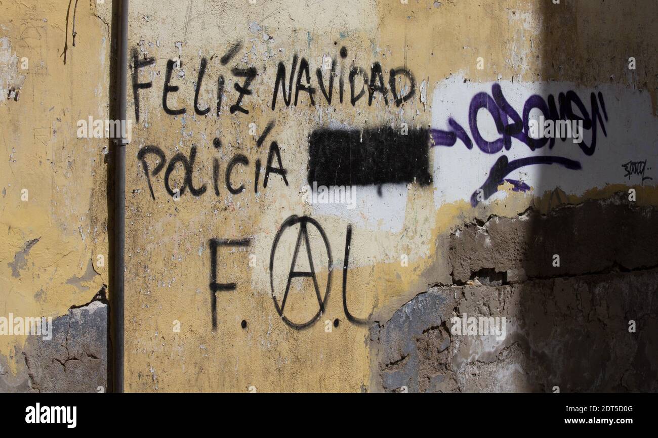 Merry Christmas police graffiti with an abusive term painted out.  Portuguese. Stock Photo