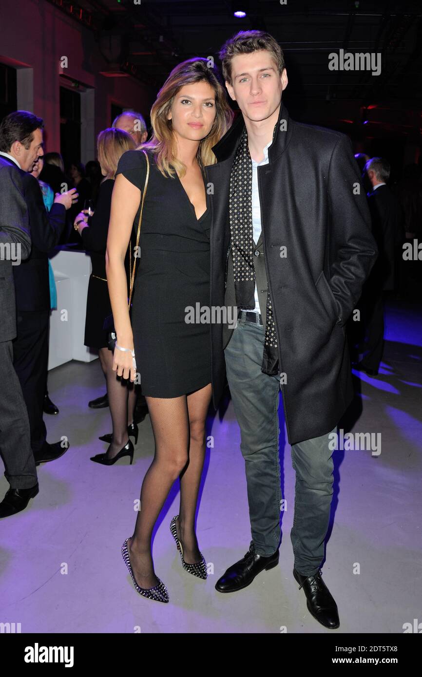 Jean Baptiste Maunier , Isabelle Funaro attending Pirelli calendar 50th  anniversary party held in Palais de Tokyo in Paris, France on January 30,  2014. Photo by Alban Wyters/ABACAPRESS.COM Stock Photo - Alamy