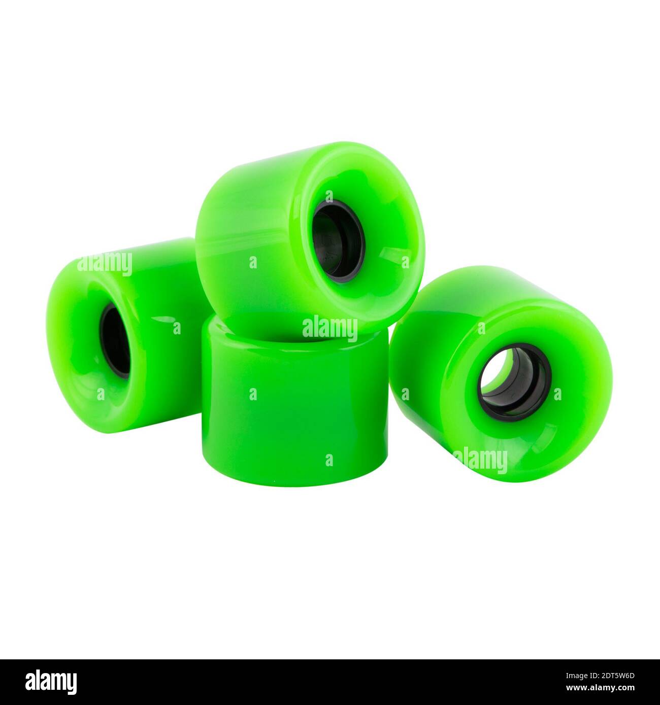 Close-up Of Green Roller Skate Wheels Against White Background Stock Photo