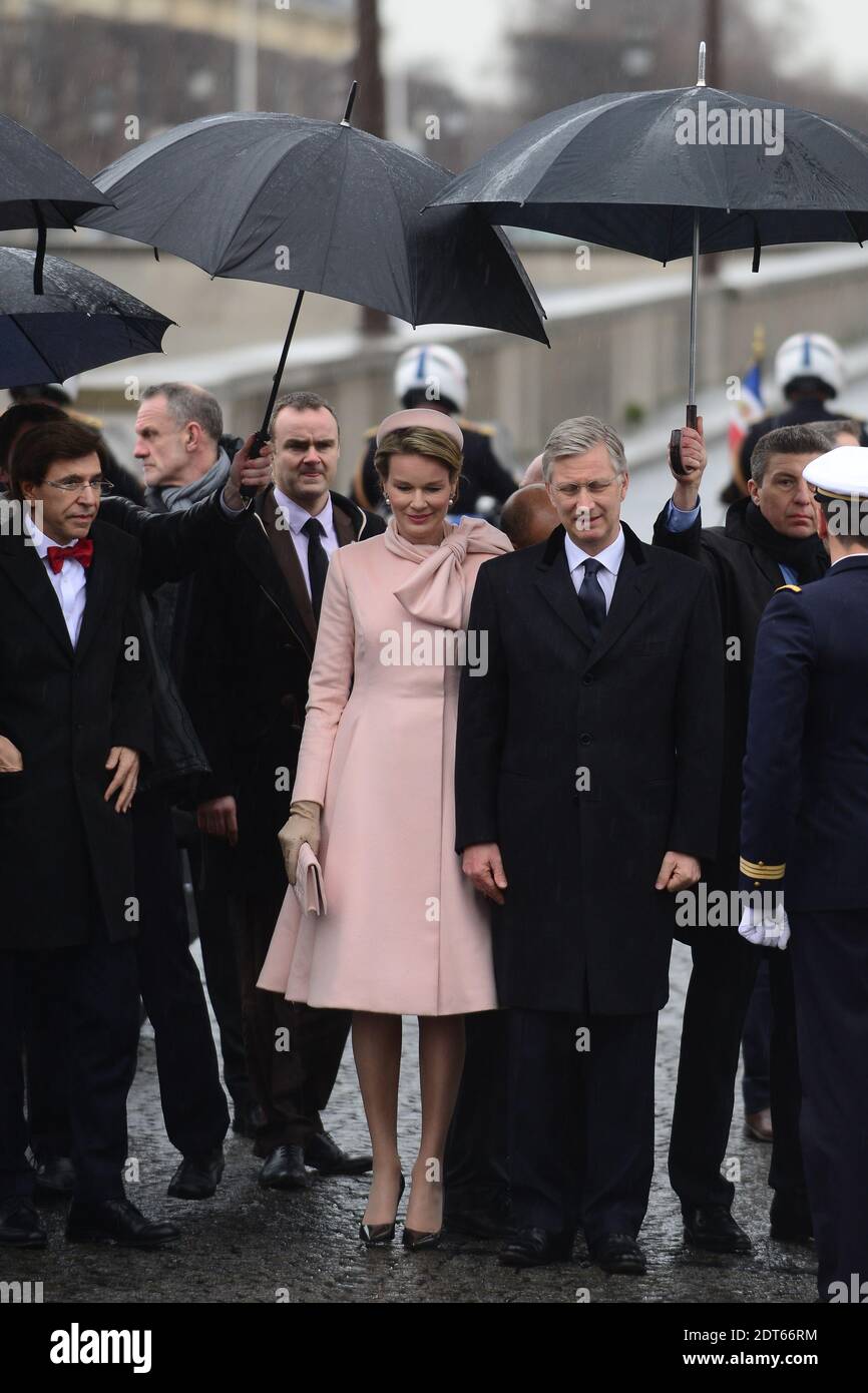 King Philippe and Queen Mathilde of Belgium, here with PM Elio Di Rupo, lay a wreath on the statue of King Albert I, in Paris, France on the first day of their state visit to France, on February 6, 2014. Photo by Ammar Abd Rabbo/ABACAPRESS.COM Stock Photo