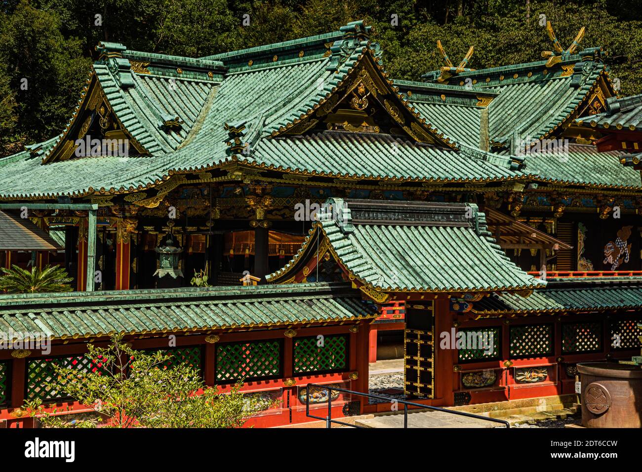 Kunozan Toshogu Shrine in Shizuoka, Japan. The fireproof metal roofs of the buildings are richly decorated Stock Photo