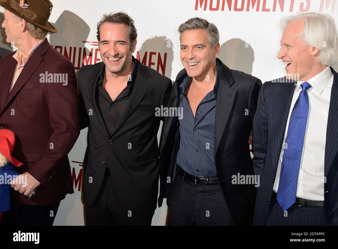 Jean Dujardin and George Clooney attending the premiere of the film 'The  Monuments Men' held at