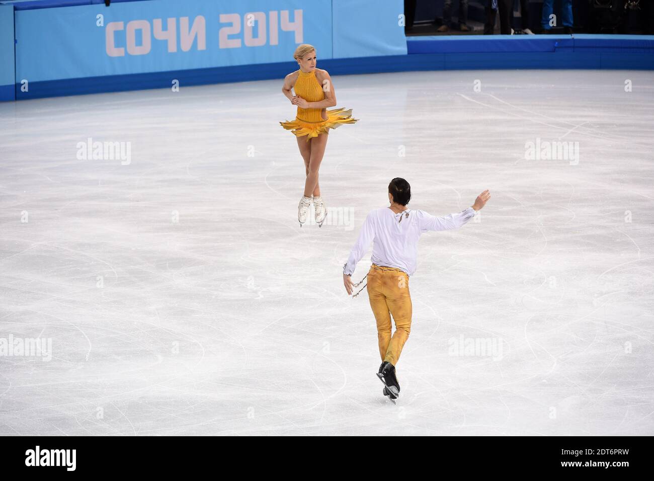 Tatiana Volosozhar and Maxim Trankov of Russia skate during their gold