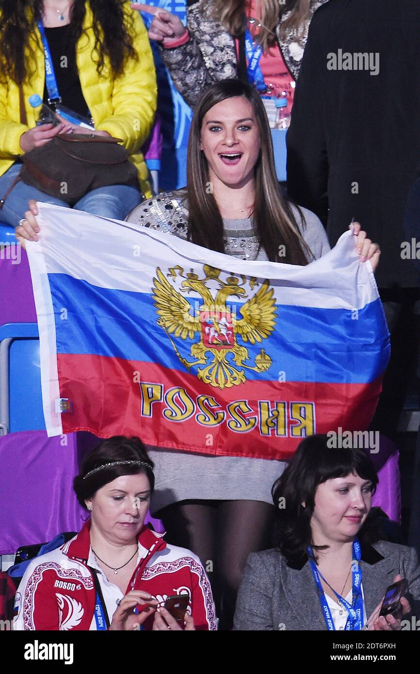 Russian pole vaulter Yelena Isinbayeva watch the Pairs Free Skating on