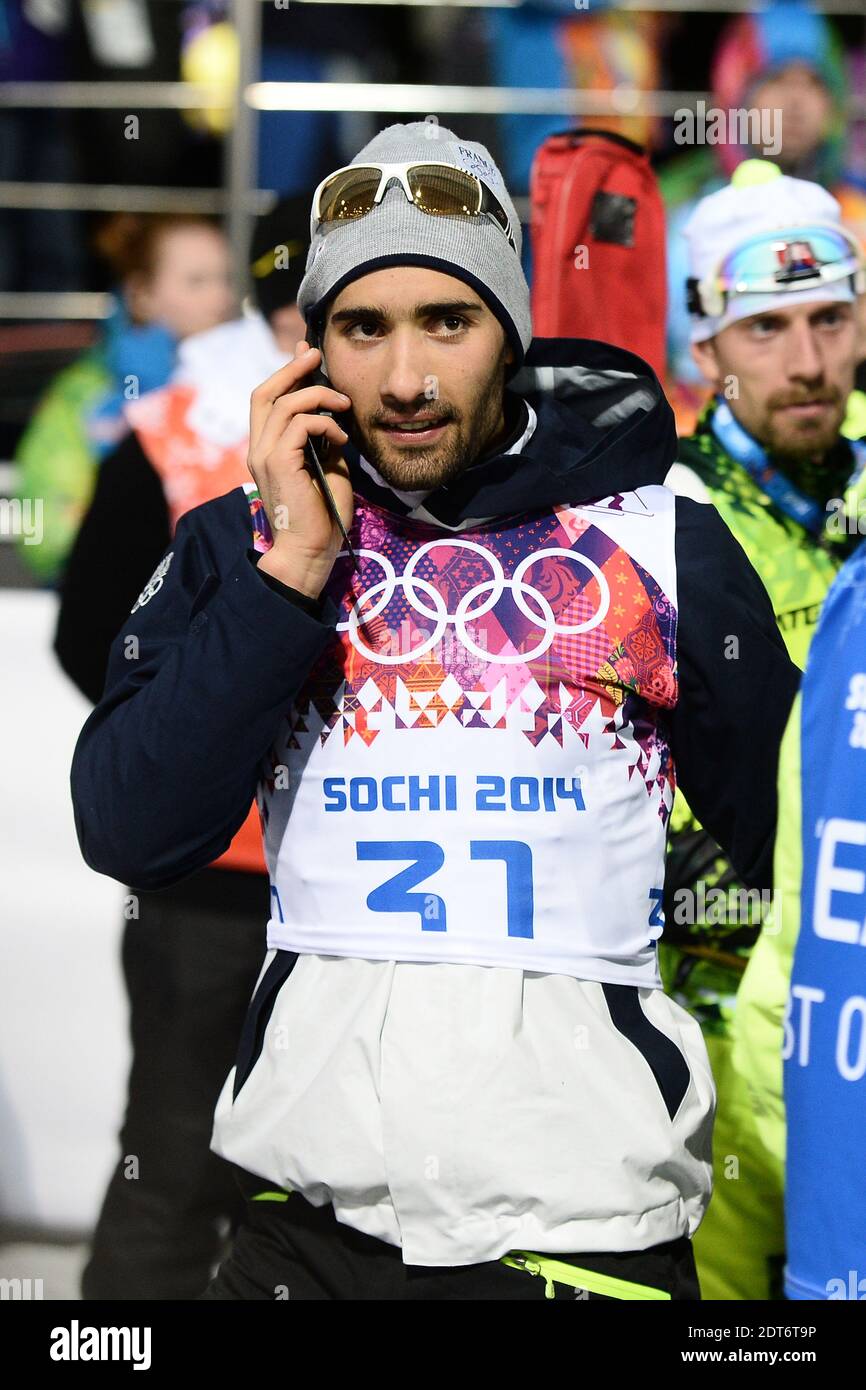 Martin Fourcade of France speaks on his mobile phone after the Men's Individual 20 km during day six of the Sochi 2014 Winter Olympics at Laura Cross-country Ski & Biathlon Center in Sochi, Russia on February 13, 2014. Photo by Gouhier-Zabulon/ABACAPRESS.COM Stock Photo