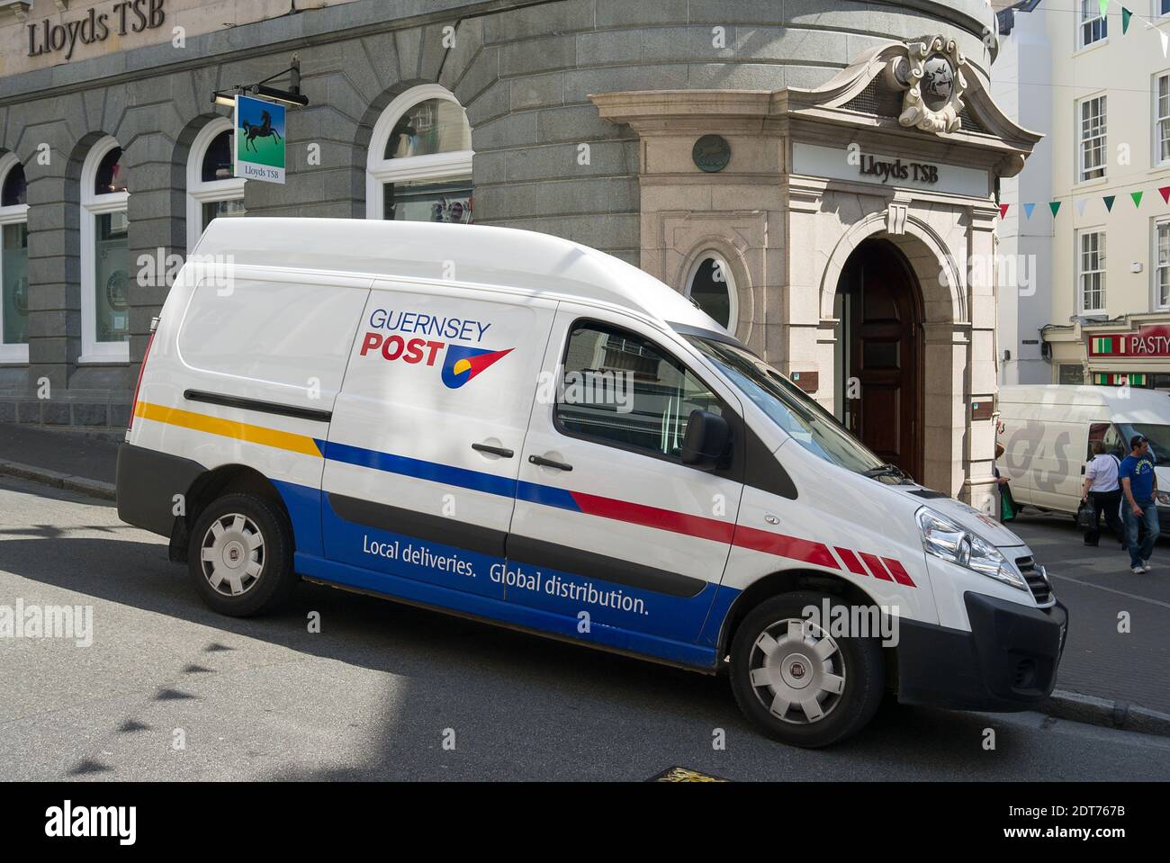 Guernsey Post Fiat van parked on a steep hill in St Peter Port Guernsey UK Stock Photo