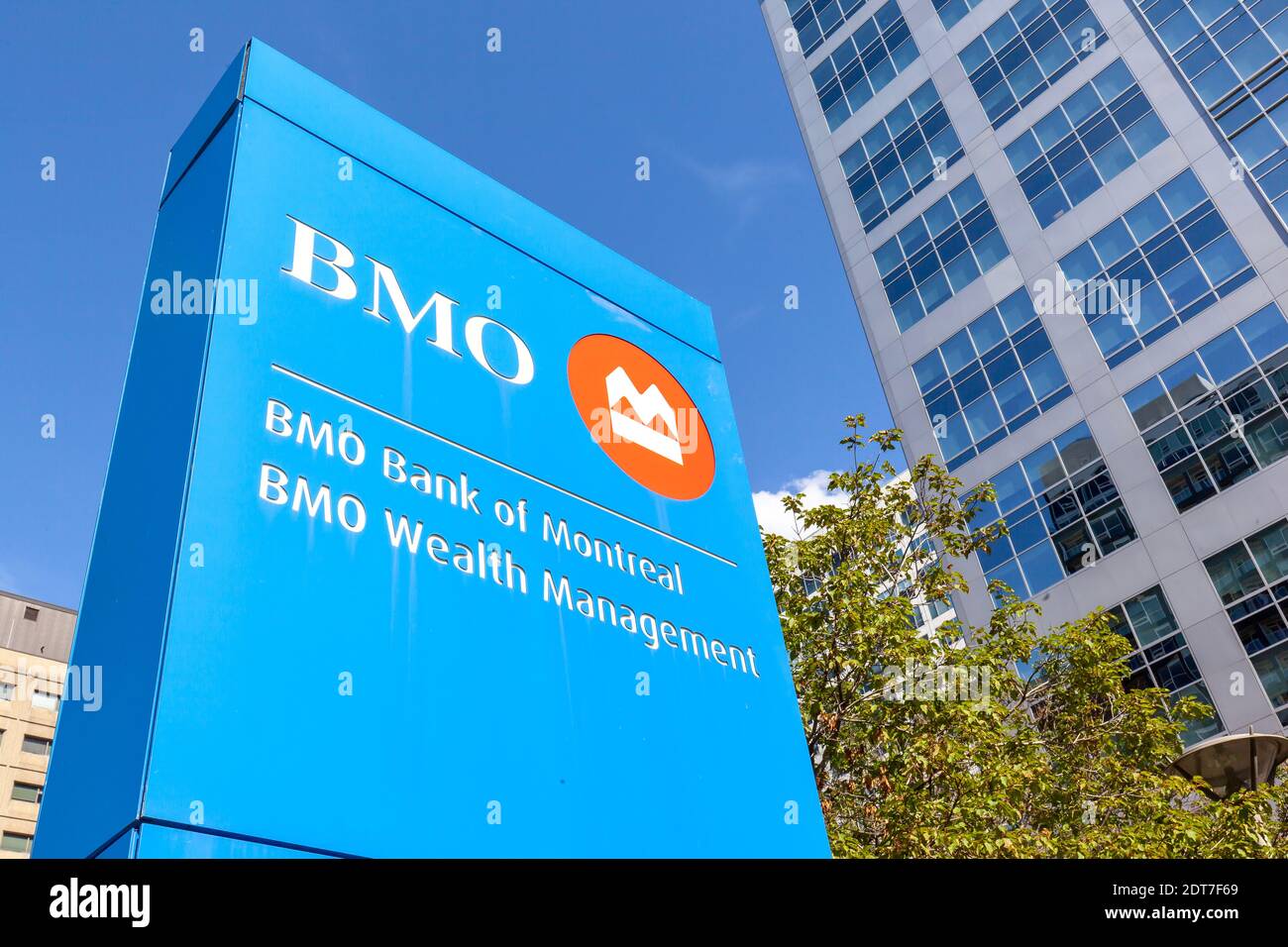 Sign of BMO Bank of Montreal and wealth management at BMO Building on Laurier Avenue in Ottawa Canada. Stock Photo