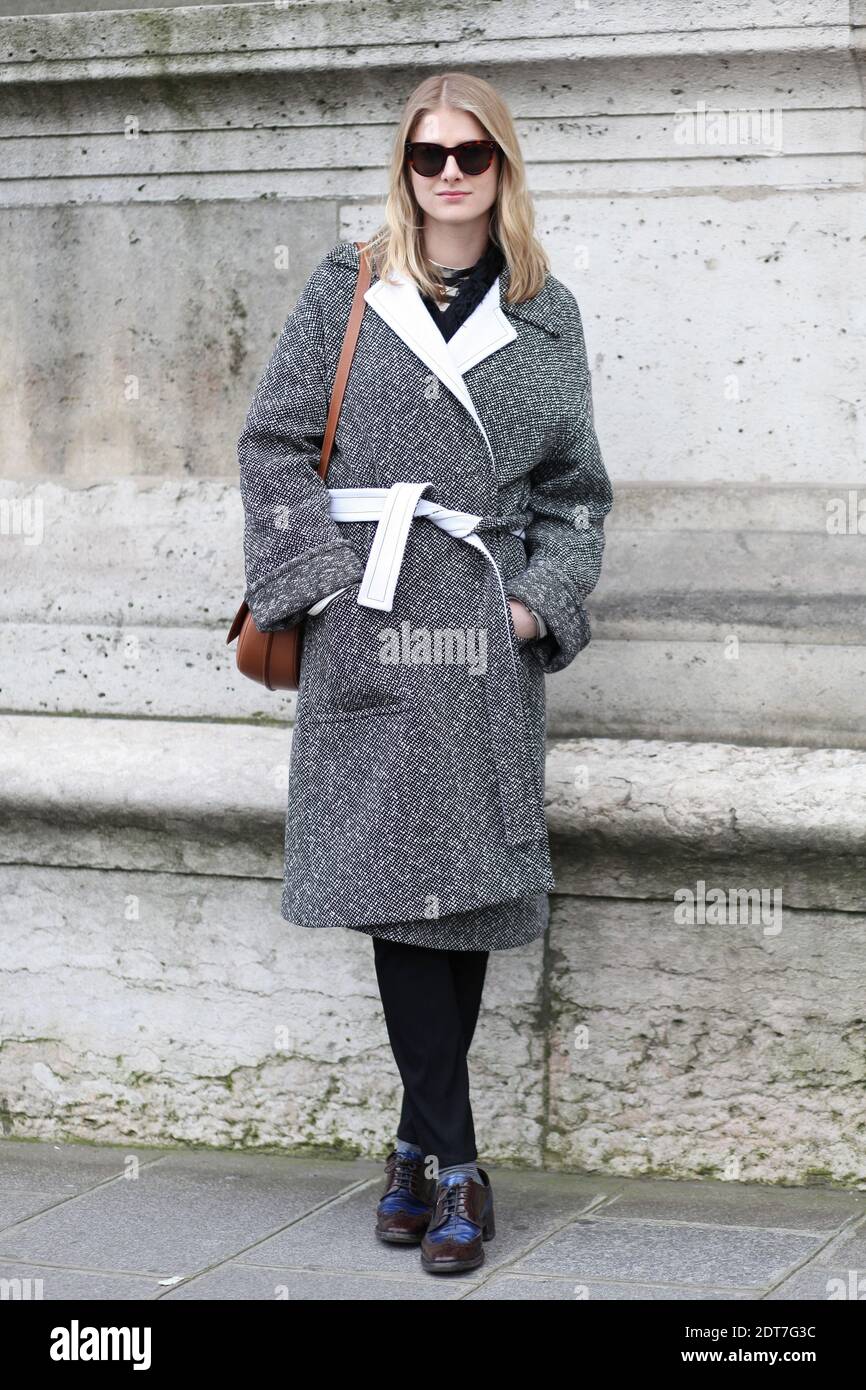 Laura arriving for Yang Li Fall-Winter 2014-2015 Ready-to-Wear show held at  Le Palais des Beaux Arts, Paris, France on February 26th, 2014. She is  wearing Balenciaga coat and Prada shoes. Photo by