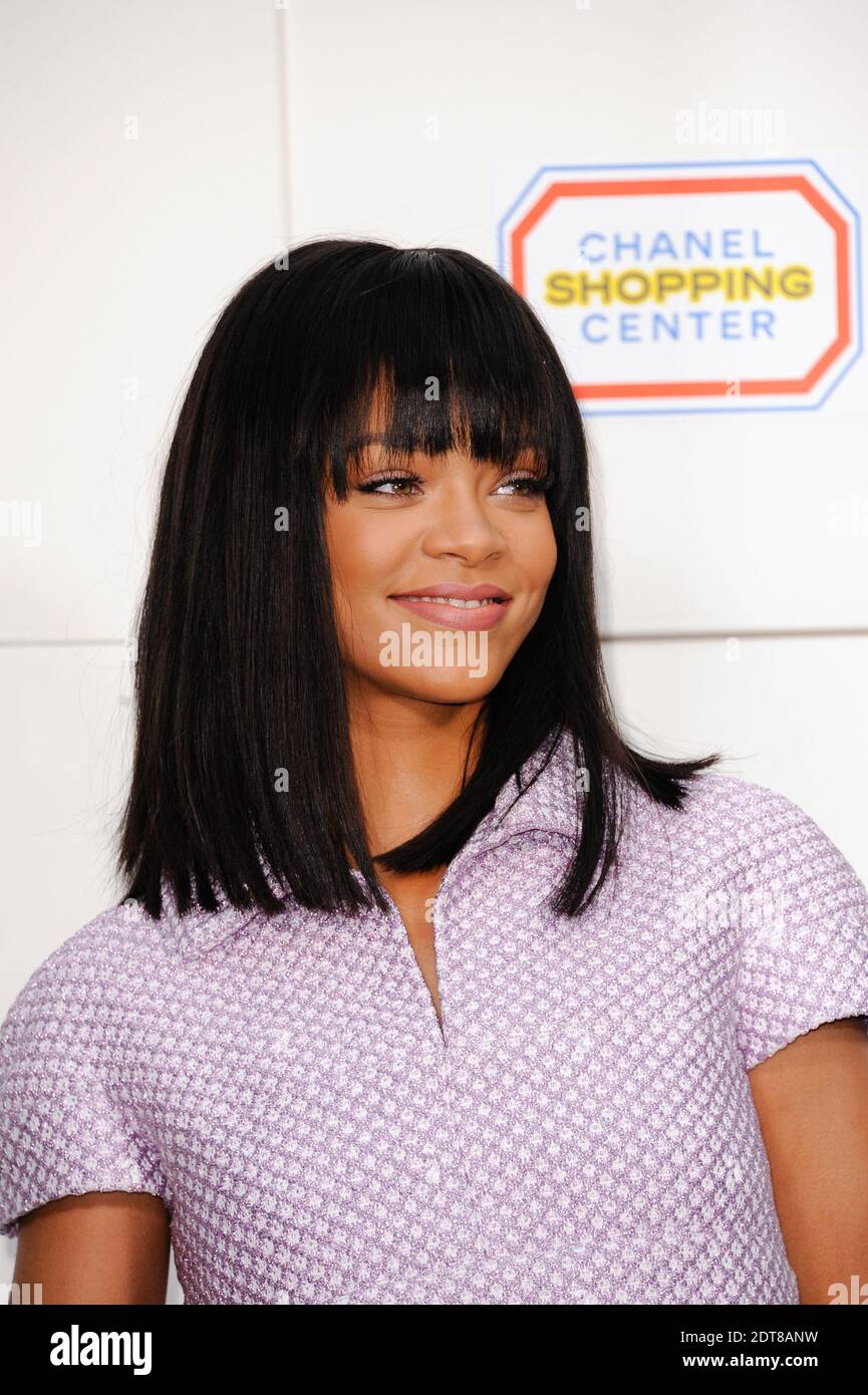 Rihanna poses at a photocall upon arrival for the Chanel Fall-Winter