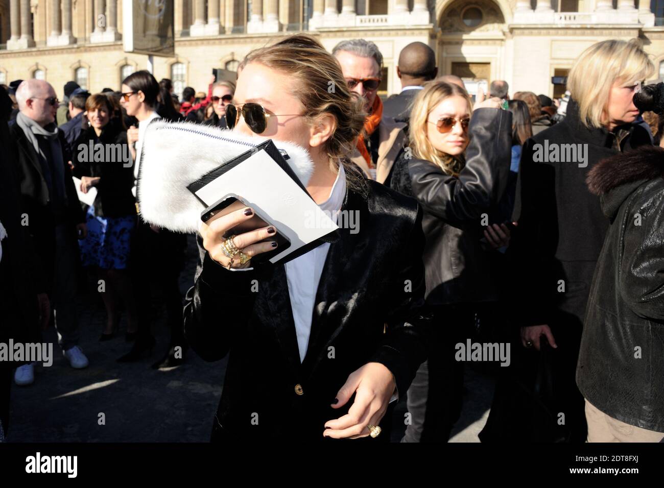 Ashley Olsen (L) and Mary-Kate Olsen arriving for the Louis Vuitton  Fall-Winter 2014/2015 Ready-To-Wear collection show held at Cour Carree du  Louvre in Paris, France on March 5, 2014. Photo by Alban