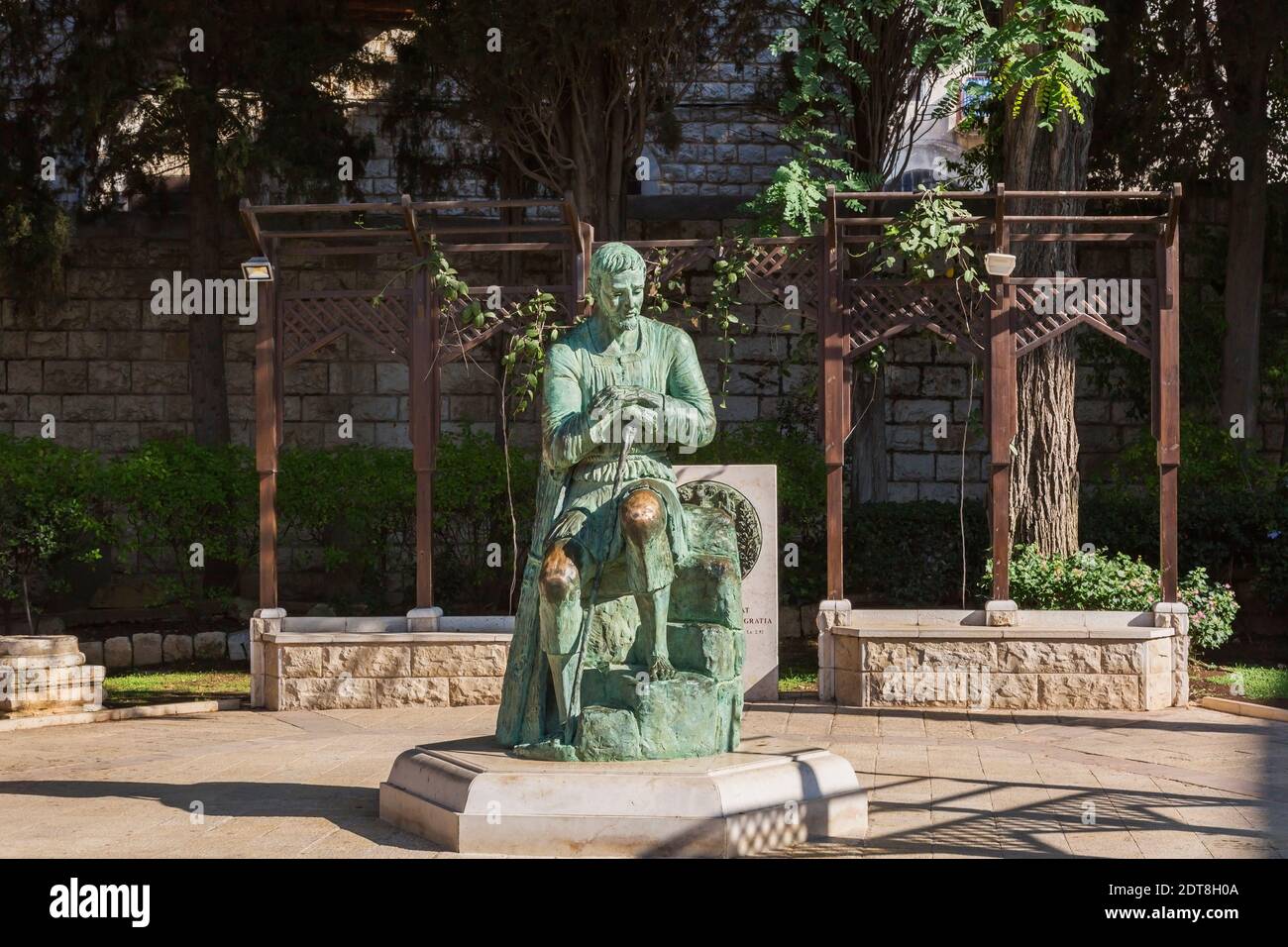 Bronze statue of SaintJoseph in garden in inner courtyard of The