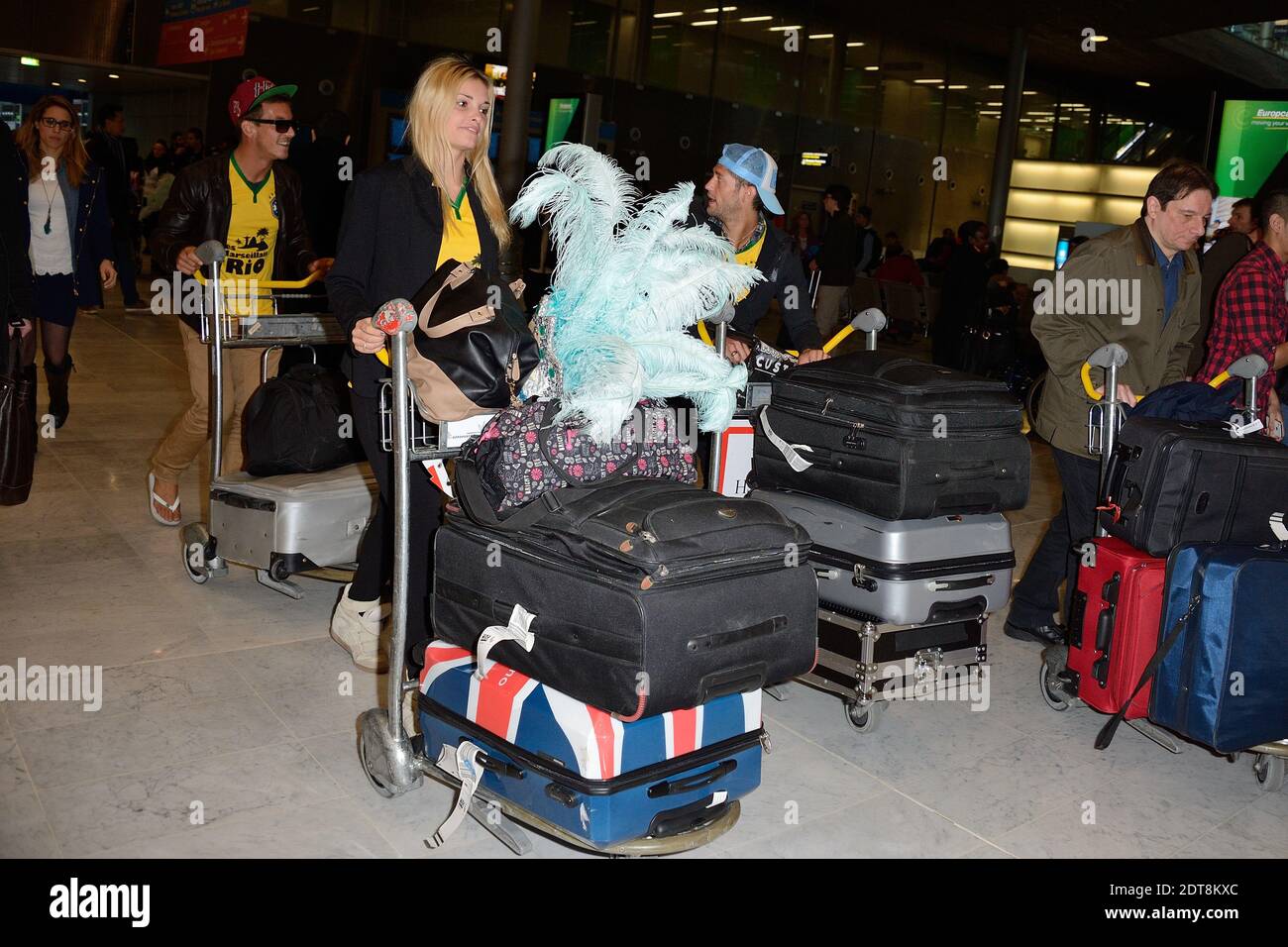 Charlotte Les Marseillais à Rio Micha, Charlotte et Paga de retour a Paris apres le tournage de l'emission 'Les  Marseillais a Rio' pour W9, le 06 mars 2014, a l'aeroport Roissy Charles de  Gaulle, Paris. Photo by
