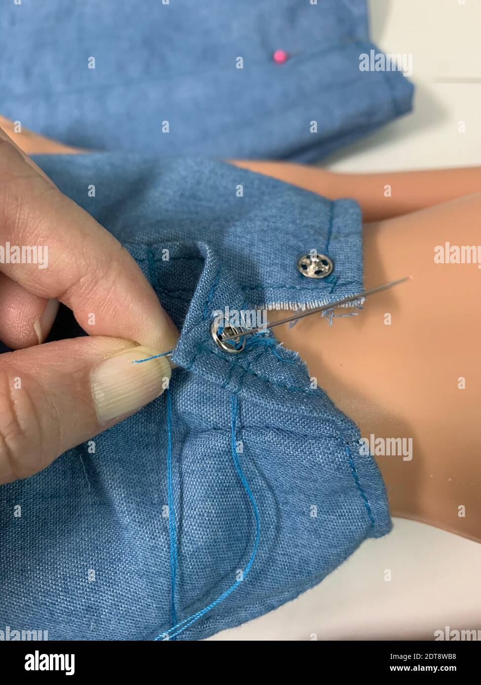 Person sewing southeast hires stock photography and images Alamy