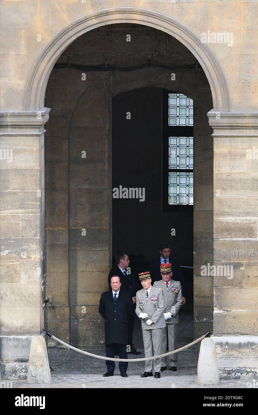 French President Francois Hollande and the President of the People's Republic of China Xi Jinping review the troops during a ceremony at the Hotel des Invalides in Paris, France on March 26, 2014. The Chinese President is on a three-day state visit to France. Photo by Nicolas Gouhier/ABACAPRESS.COM Stock Photo