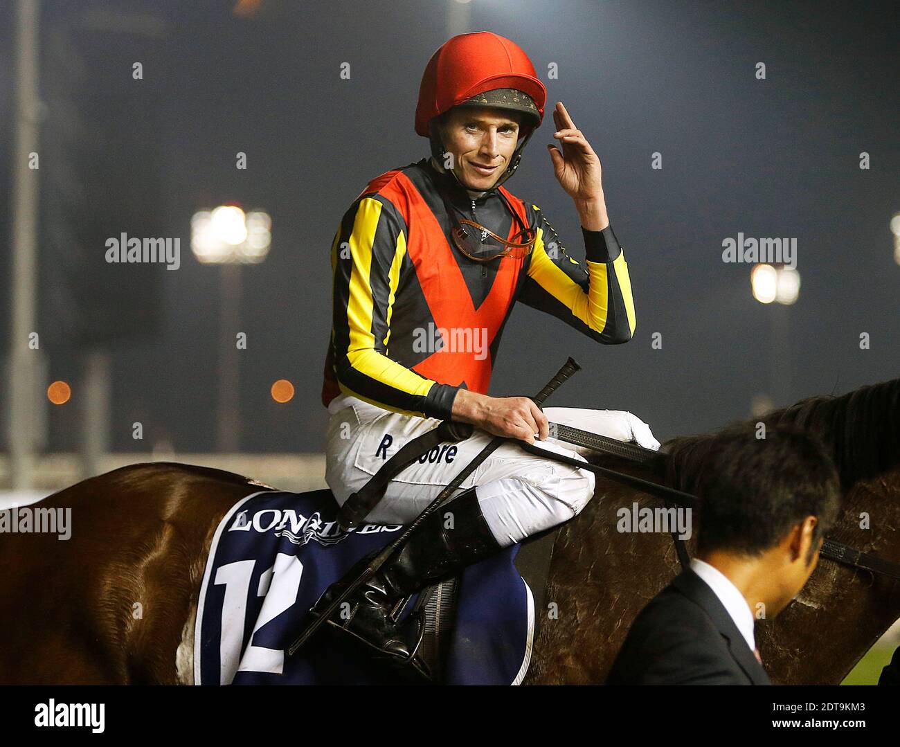 Britain's jockey Ryan Moore on his horse Gentildonna celebrates after winning the Dubai Sheeba Classic raceheld on Dubai World Cup day on March 29, 2013 at Meydan racecourse in Dubai, United Arab Emirates. A cosmopolitan gathering of horses from seven different countries contest the US$10 million Emirates Dubai World Cup at Meydan racecourse. Photo by Khaled Salem/ABACAPRESS.COM Stock Photo