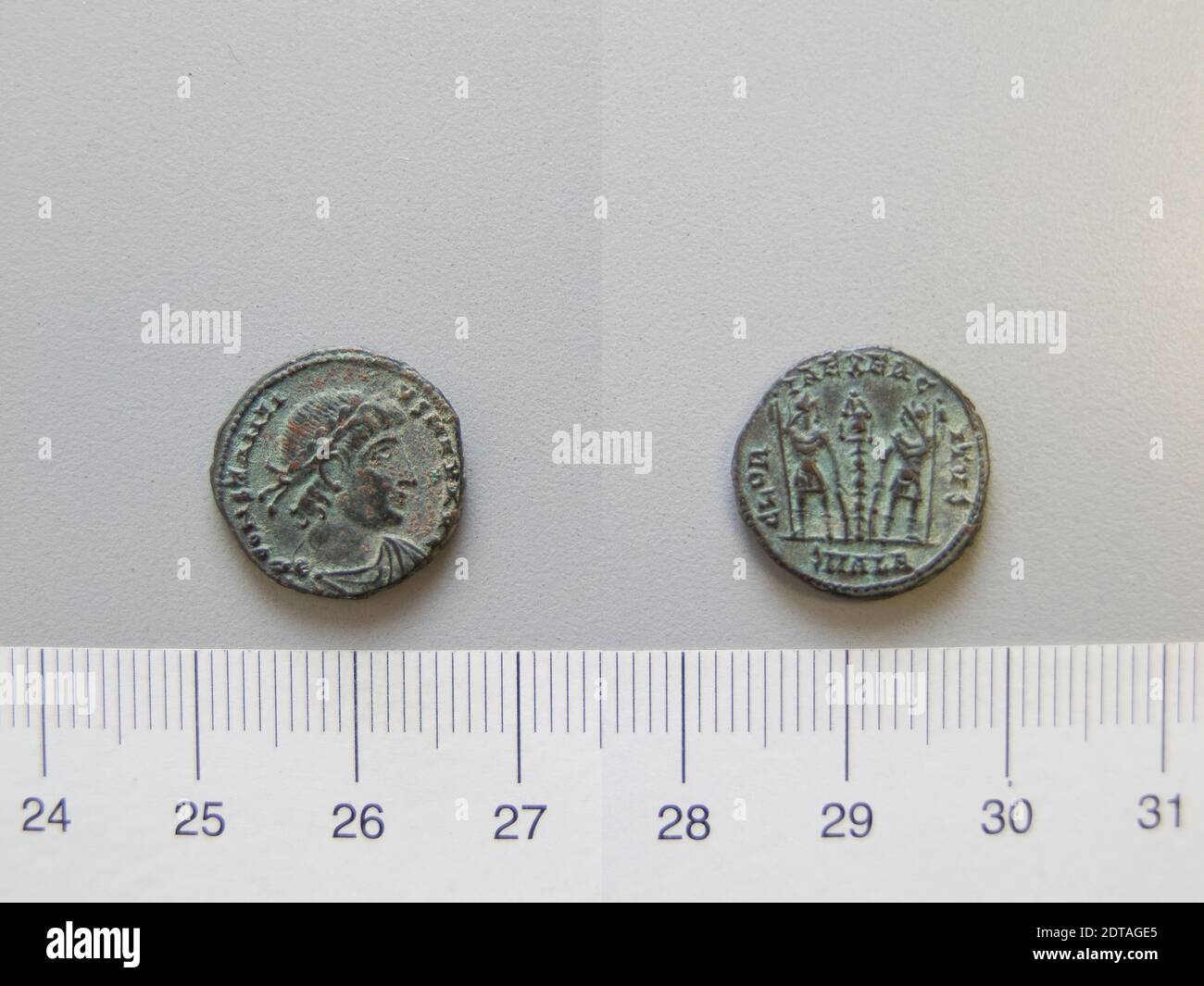 Ruler: Constantine I, Emperor of Rome, A.D. 285–337, ruled A.D. 306–337, Mint: Alexandria, Honorand: Constantine II, Emperor of Rome, A.D. 316–340, 1 Nummus of Constantine I, Emperor of Rome from Alexandria, 335–37, Argentiferous bronze, 2.01 g, 6:00, 15.7 mm, Made in Alexandria, Egypt, Roman, 4th century, Numismatics Stock Photo