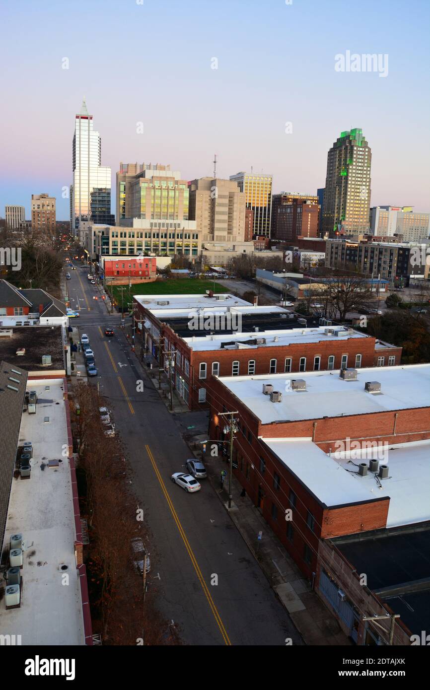 Downtown rises above the trendy Warehouse District at dusk in Raleigh