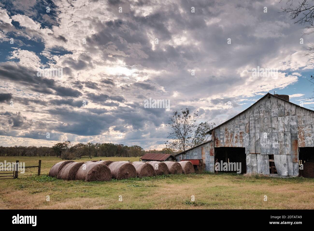 Old wooden hay barn exterior on a farm or ranch in Pike Road Alabama, USA. Stock Photo