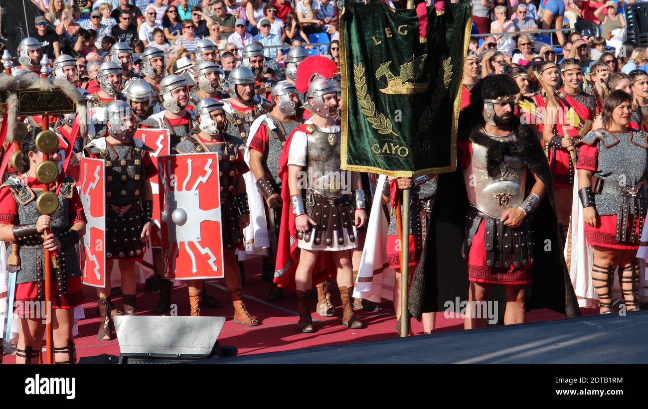 Annual festival in Cartagena, Spain is the Cartaginians and Romans. The standard bearers and Roman soldiers listen to their generals rallying speech. Stock Photo