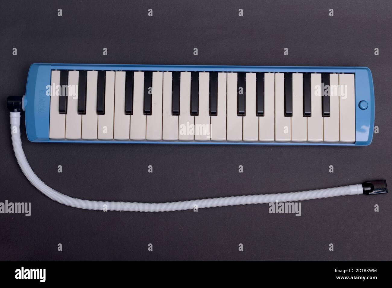 Pianica blow organ musical instrument with black background Stock